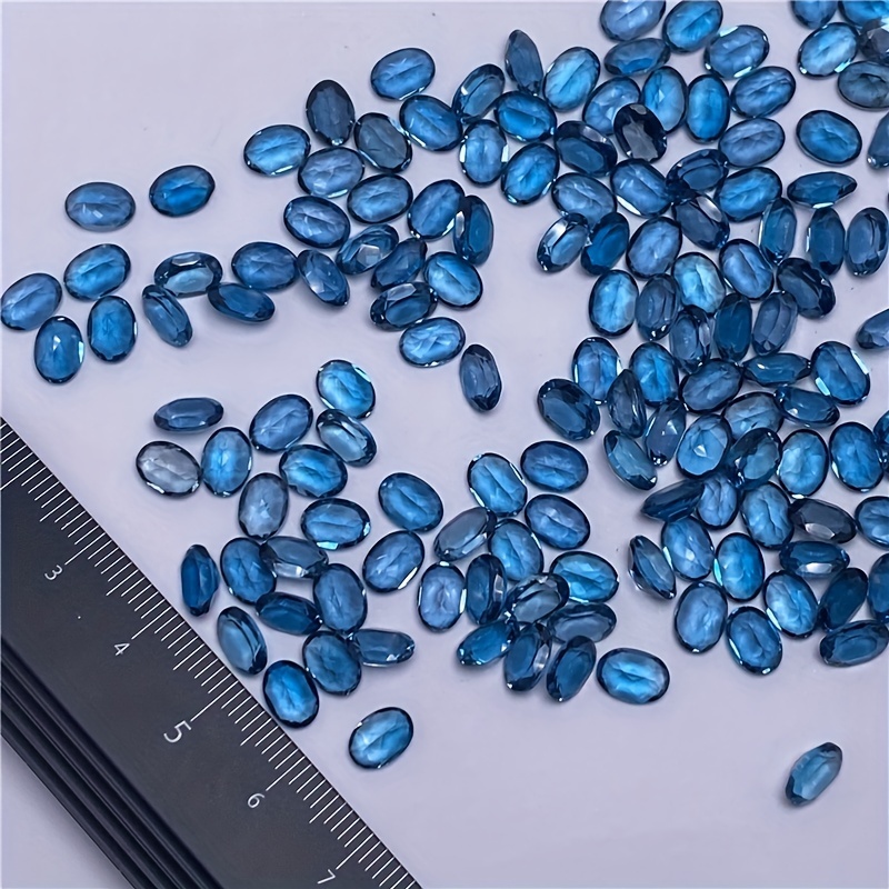 1 على شكل توباز بيضاوي أزرق طب - مراجعة Jewelry Making London وسعره