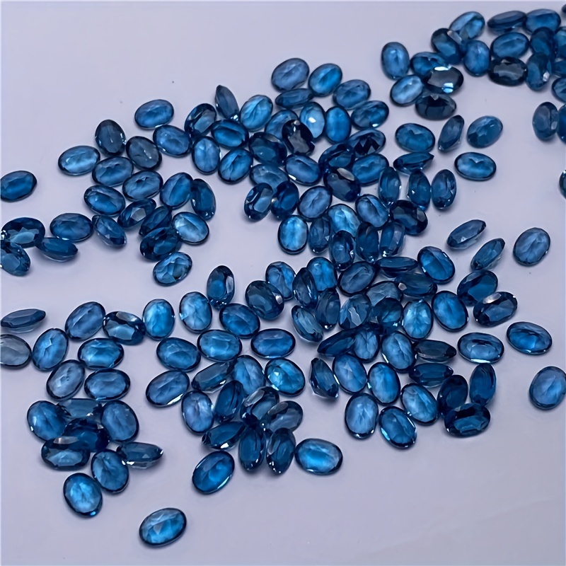 1 على شكل توباز بيضاوي أزرق طب - مراجعة Jewelry Making London وسعره